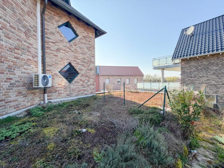 58 Flachdach linke Garage